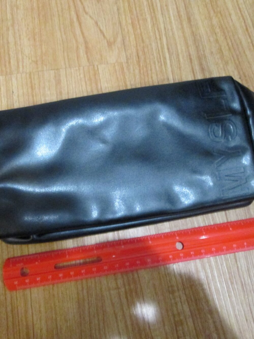 Yves Saint Laurent Parfums MYSLF line Black toiletry bag Sleek zipper bag